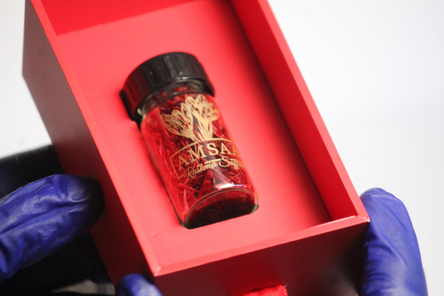 Kashmiri Saffron Premium Gift Pack from Amsaa displayed in a red box, showing real, authentic Kesar (Zafran) saffron.